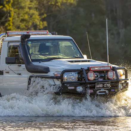 4x4 driving through water