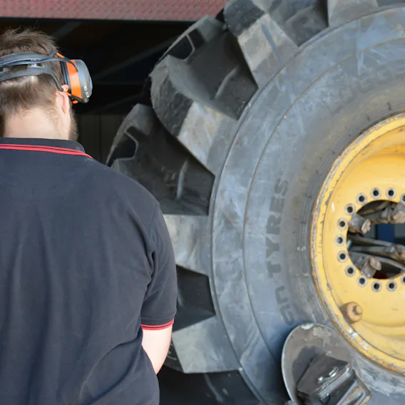 Trident tyres team working on tractor wheels and tyres